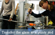 Transfer the glass to a punty rod